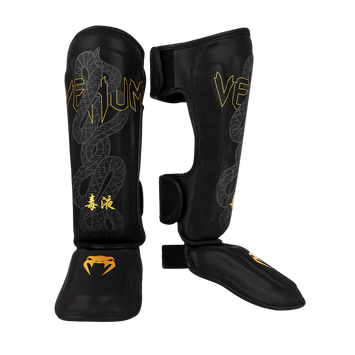 Venum Scheenbeschermers Serpenti Zwart/Zilver/Goud